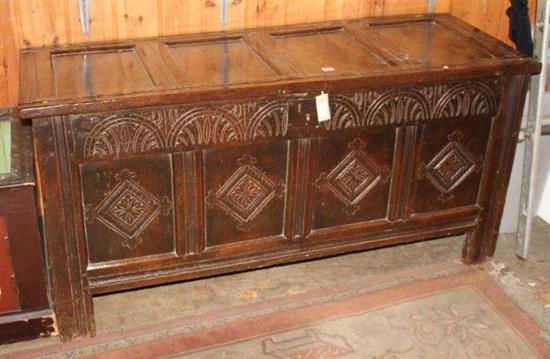 Late 17th century oak coffer with foliate lunette and lozenge-carved front